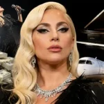Lady Gaga performing on stage during The Mayhem Ball tour, illustrating her net worth and business empire